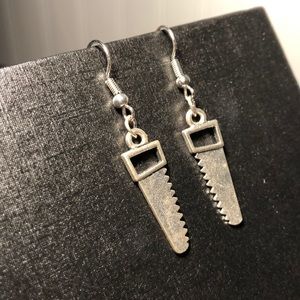 Alternative dangle buzzsaw earrings